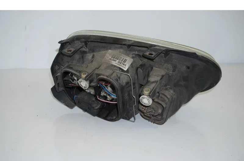 Optique avant principal gauche (feux)(phare) pour VOLKSWAGEN GOLF 4