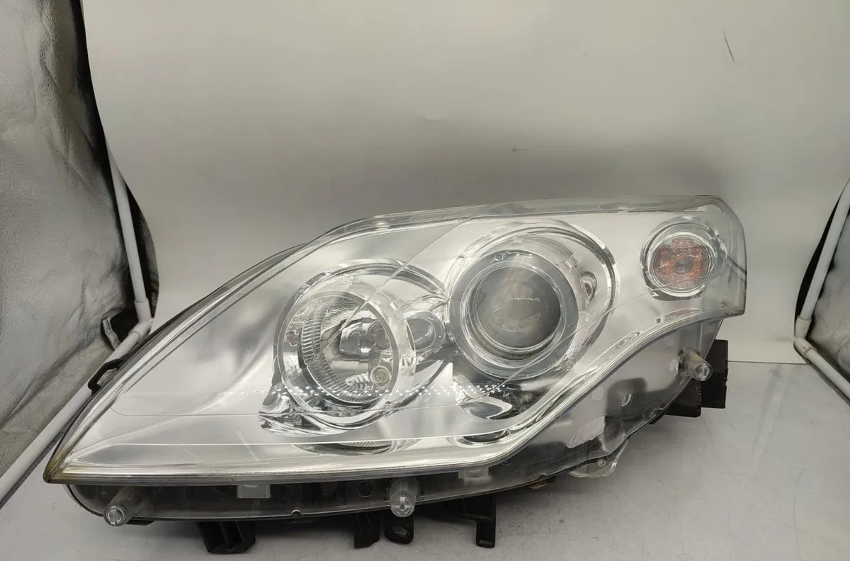 Phare gauche RENAULT LAGUNA 3 PHASE 1 BREAK occasion